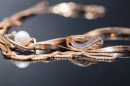 Elegant gold ring decorated with small precious stonesの写真素材