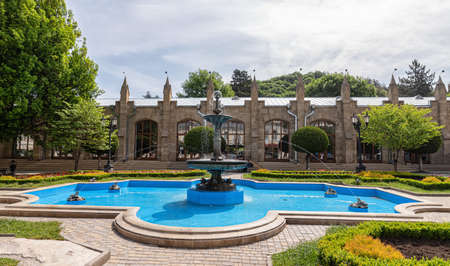 Beautiful clean fountain and flower beds in the recreation parkの写真素材