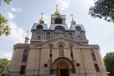 The Orthodox church of healer Panteleimon . A brick-built temple with several domes decorated with crossesの写真素材