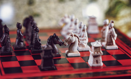 Counteraction of chess whiguras on a chessboardの写真素材