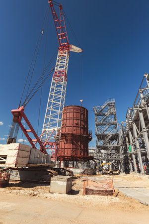 Installation of a super-heavy chemical reactor using a crawler crane.の写真素材