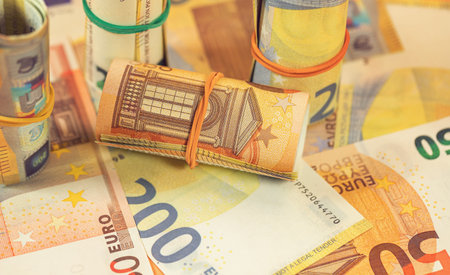 Background of twisted and scattered Euro banknotesの写真素材