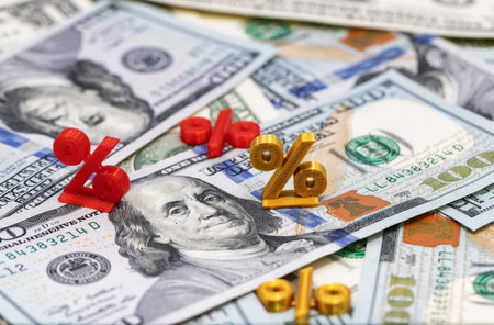 Mathematical symbols of interest lie on top of the banknotes