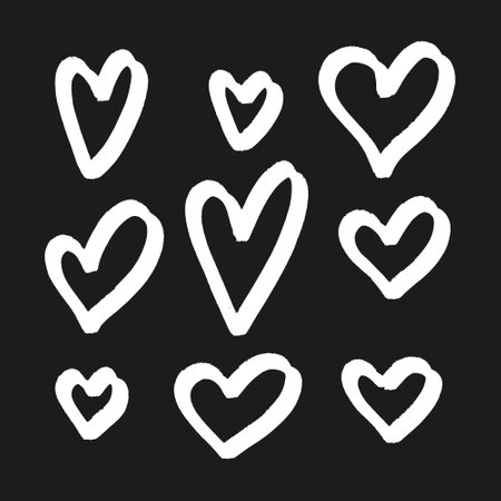 Set of hand drawn doodle hearts isolated on black background. Vector illustration.のイラスト素材
