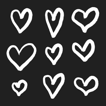 Set of hand drawn hearts isolated on black background. Vector illustration.のイラスト素材