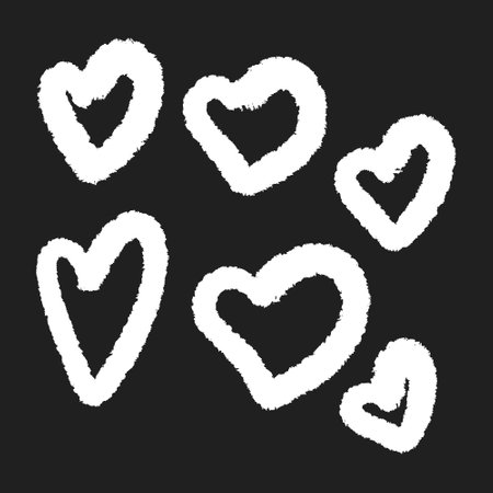 Hand drawn hearts set. Vector illustration isolated on a black background.のイラスト素材