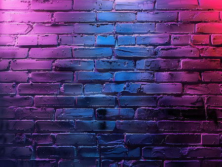 A brick wall with pink and blue lightsの素材