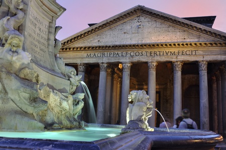 Evening in Rome with teal lighting on the fountain and spot lights on the Pantheonの写真素材