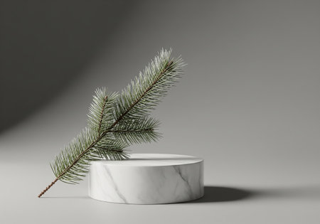 White marble podium with fir branch on grey background. 3d renderの素材