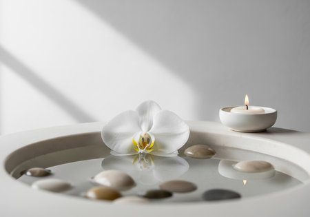 Spa still life with white orchid flower, candles and stonesの素材