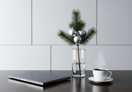 Laptop, coffee cup and christmas tree on the table. 3d renderingの素材