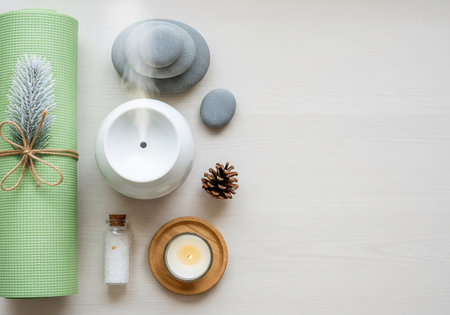 Spa setting on white wooden background, top view with copy spaceの素材
