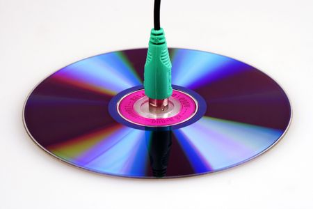 PS/2 connector connected to a compact disc.