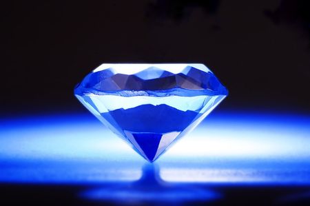 A diamon in blue background with nimbus.の写真素材
