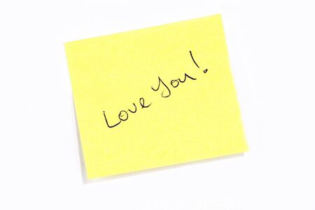 Sticky post it note with &quot,Love You&quot, wording.