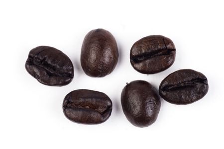 An extreme close up of coffee bean.