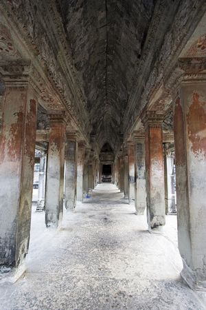 Angkor Wat interior corridor view with pillar. 
