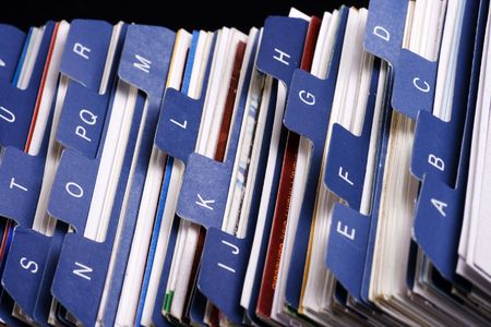 Close up of desktop business card index holder.の写真素材