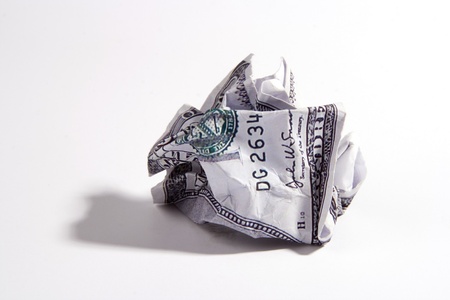 A crumpled one hundred US dollar note.の写真素材