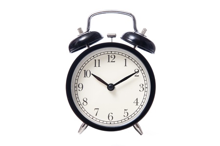 Black classic style alarm clock isolated on white