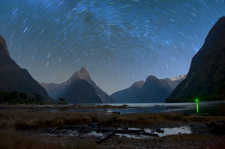 Milford sound at night with startrail, New Sealandの写真素材