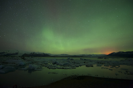 Jokulsarlon Glacial Lagoon at north light in the sky.の写真素材