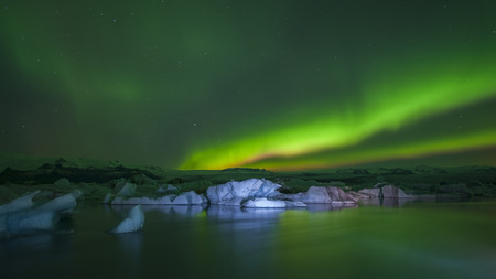 Jokulsarlon Glacial Lagoon at north light in the sky.の写真素材