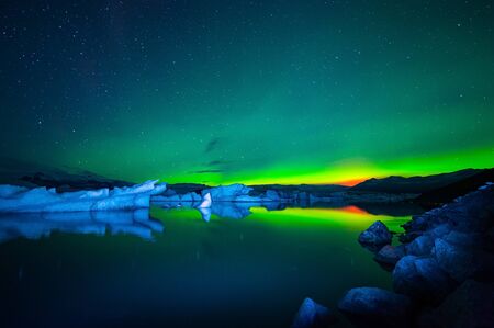 Jokulsarlon Glacial Lagoon at north light in the sky.の写真素材