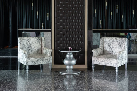 The room of hotel with two chairの写真素材