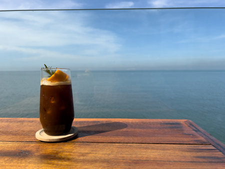 relax with desert and coffee on rhe beachの写真素材