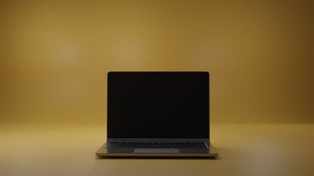 The laptop on the Yellow tableの写真素材
