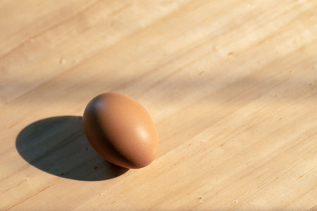 The brown eggs on wooden tableの写真素材