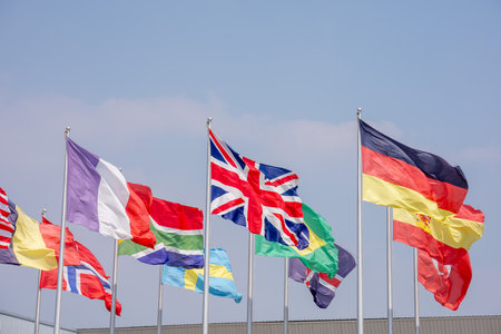 national flag agiant wind isolate on whiteの写真素材