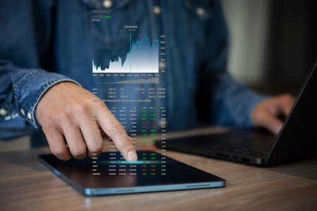 The business man with floating icon show uptrend of investment stockの写真素材