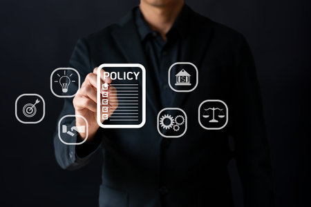 The business point to Policy floating screen icon show symbolic of policy manual in businessの写真素材