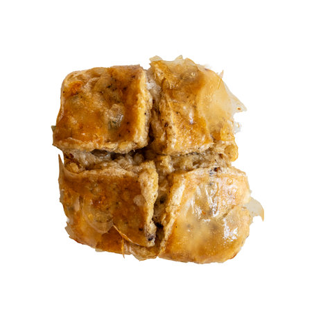 Photo of a fried fish patty on a white background, taken with a 45Mp high resolution camera.