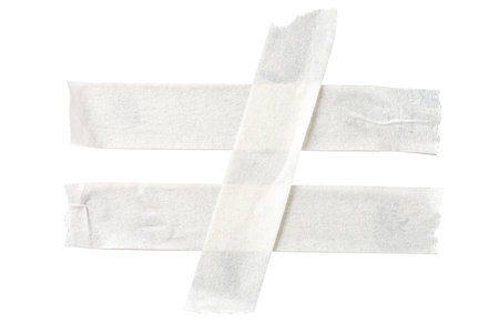 White marking tape paper in not Equals sign shape isolate on whiteの写真素材