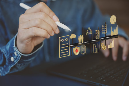 An image conveys that businesspeople or employees are working using policies to oversee business operations.の写真素材