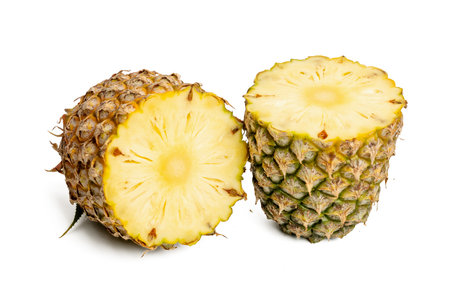 The Photo of pineapple taken with a high-resolution camera stacking focus technic using on a white background.の写真素材