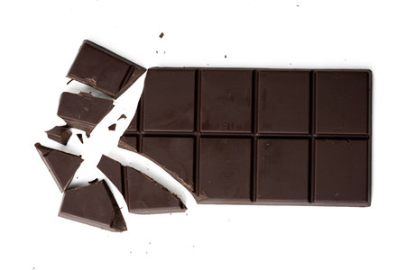 The Photo of chocolate bar taken with a high-resolution camera using the focus-stacking technique on a white background.の写真素材