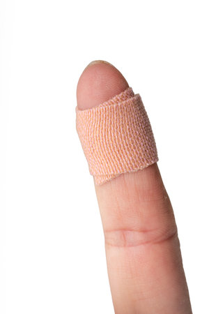 The High-resolution photograph of a wound plaster applied to the body, taken with a high-resolution camera.の写真素材