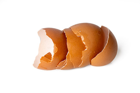 The High-resolution photograph of eggshells isolate on white, taken with a high-resolution 45MP...