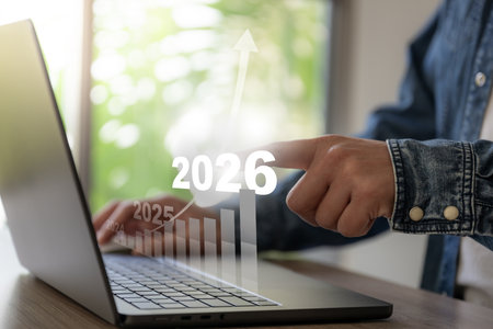 Business man work seek benifit revenue growth floating on screen target on year 2026