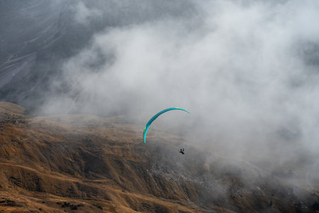 The paragliding sport at seceda peak dolomite italy