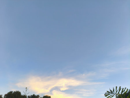Clouds and blue sky in the evening. Natural background and wallpaper.の写真素材