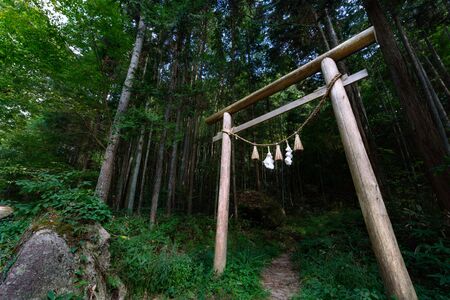 Japanese building at the entrance of the mountain Toriiの写真素材