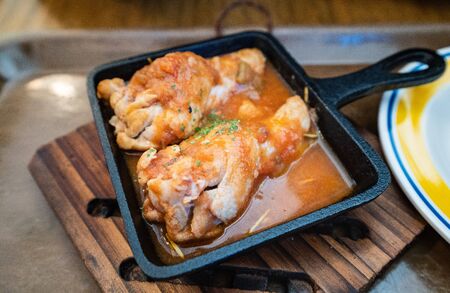 Simmered chicken with tomatoの写真素材