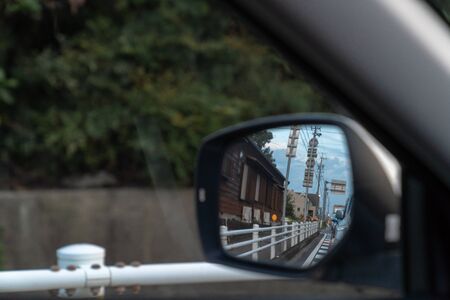 Rearview with the door mirror / Image during drivingの写真素材