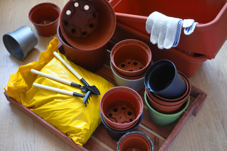 Gardening supplies on a wooden background. Gardening equipment and accessories. spring concept....