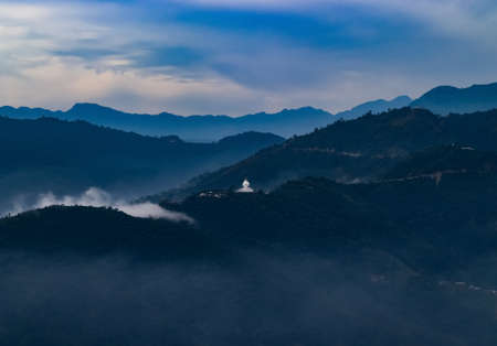 Beautiful aerial view of World Peace Pagoda located in Pokhara, Nepal from ultralight aircraft. Image also shows Pokhara city along with the buddhist stupa.の写真素材